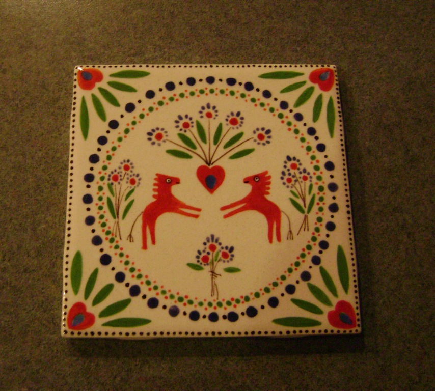 Small tile with horses   